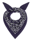 The Bandana Kerchief by The Great Inc. features a dark purple hue with a white paisley pattern, folded into a triangle and tied with two pointed ends for vintage Americana flair.