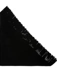 Black oversized scarf with diagonal fringe, by The Great Inc., Big Sweater Fringe Scarf on white background.