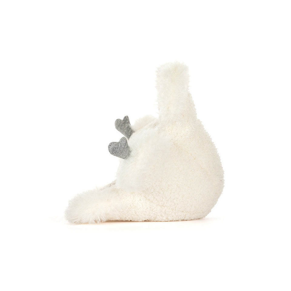 The Jelly Cat Inc. Amuseable Snowflake, a soft plush toy with silver fabric feet and a small tail, sits on its side against a plain white background—perfect for adding sparkle to any performance.