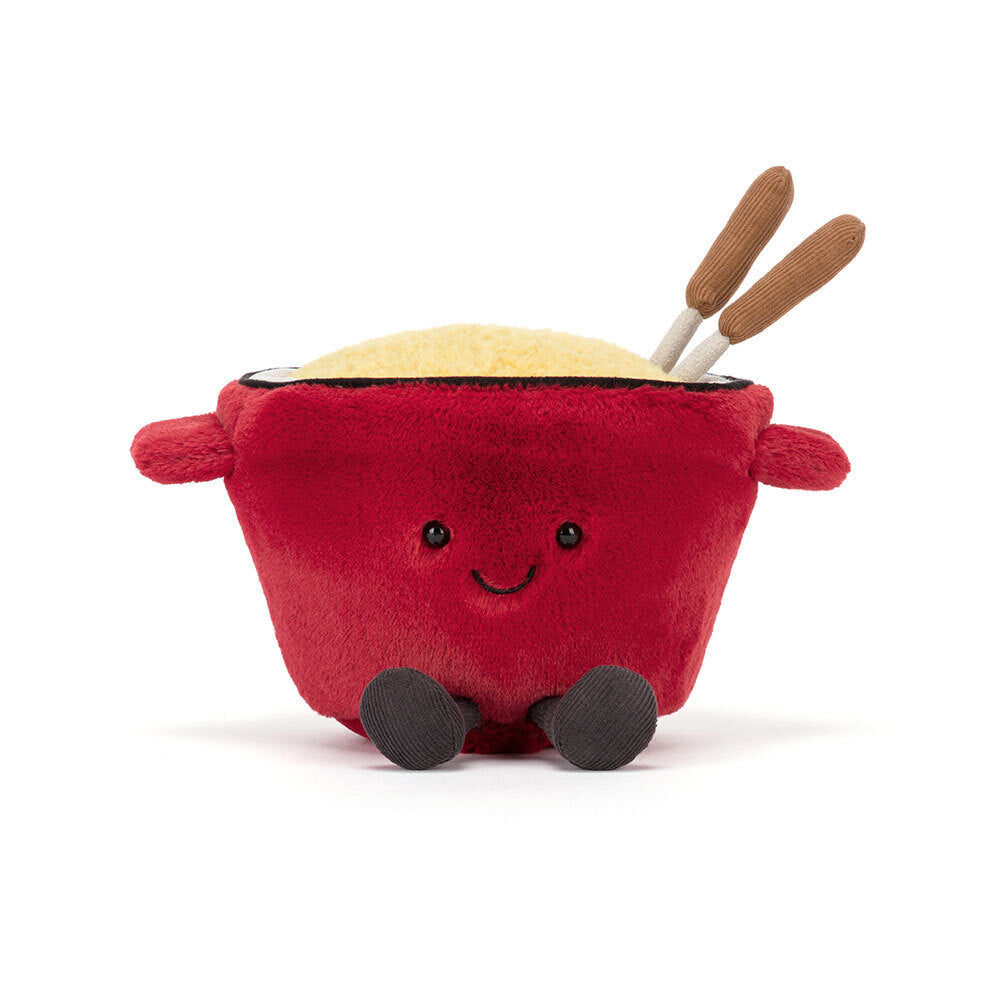 Jelly Cat Inc.’s Amuseables Cheese Fondue is a plush toy shaped like a fondue pot with a smiling face, tiny arms, black feet, fluffy yellow “cheese,” and two plush brown sticks—great for fun Swiss-themed gatherings or gifting.