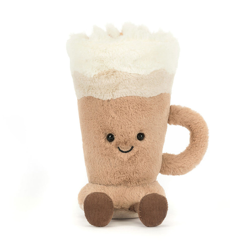 The Amuseables Latte by Jelly Cat Inc. is a plush toy shaped like a latte mug, featuring a creamy foam top, smiling face with black eyes, right-side handle, and brown feet—all set against a white background.