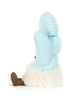 The Amuseables Mitten plush toy by Jelly Cat Inc. sits upright on a white background, showing its large light blue head, fluffy white coat, and brown shoes—your quiet companion viewed from the side.