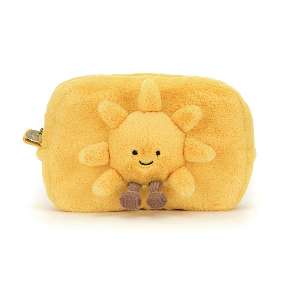 The Amuseables Sun Pouch by Jelly Cat Inc. is a soft, yellow pouch with a smiling sun face and small legs on the front, plus a zip closure on the left side—a cheerful accessory to brighten your day.