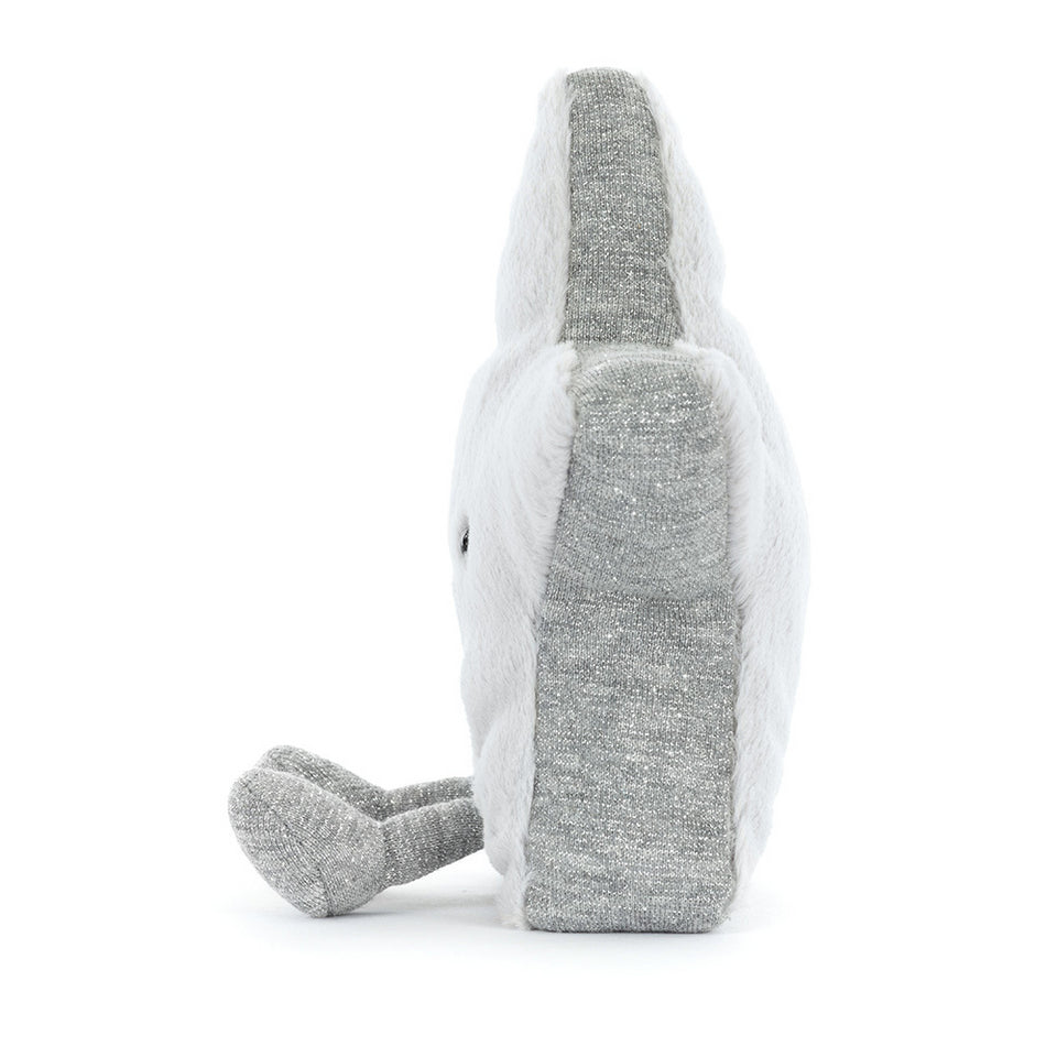Side view of the Amuseables Silver Star plush by Jelly Cat Inc., featuring a soft white body, grey underside, and a small dangling grey leg. This cuddly star stands upright—perfect for climbing fans and plush toy collectors.