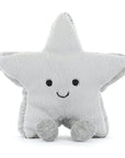 The Amuseables Silver Star by Jelly Cat Inc. is a plush toy with a soft light gray body, shiny silver edges, small silver feet, black button eyes, and a stitched smile, shown sitting upright on a white background.