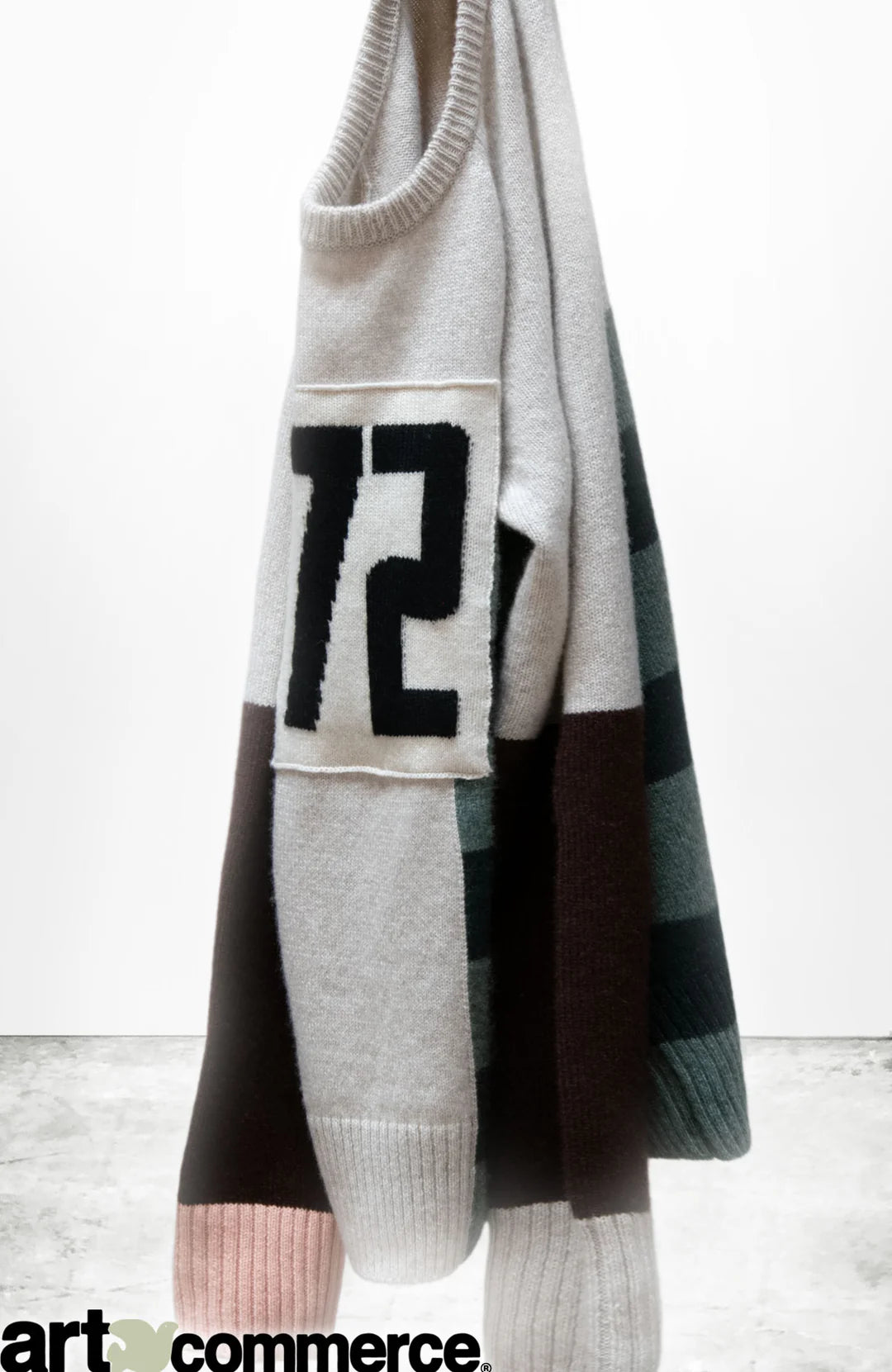 The CanyonKid 72' Cashmere Lux Crew by Free City (sparrow, LLC) is a unisex color-blocked sweater in gray, pink, brown, and black with "72" on the front and a partially visible "art + commerce." logo at the hem.