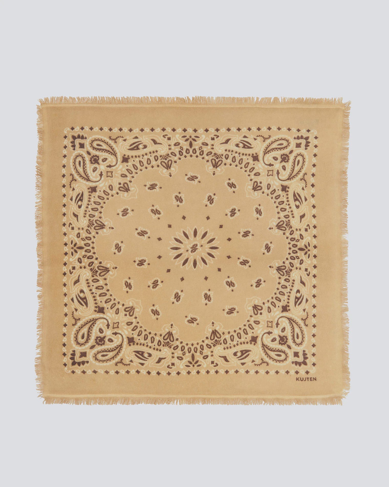 Tan cashmere bandana with brown paisley pattern and fringed edges by KUJTEN, Hachiko Bico.