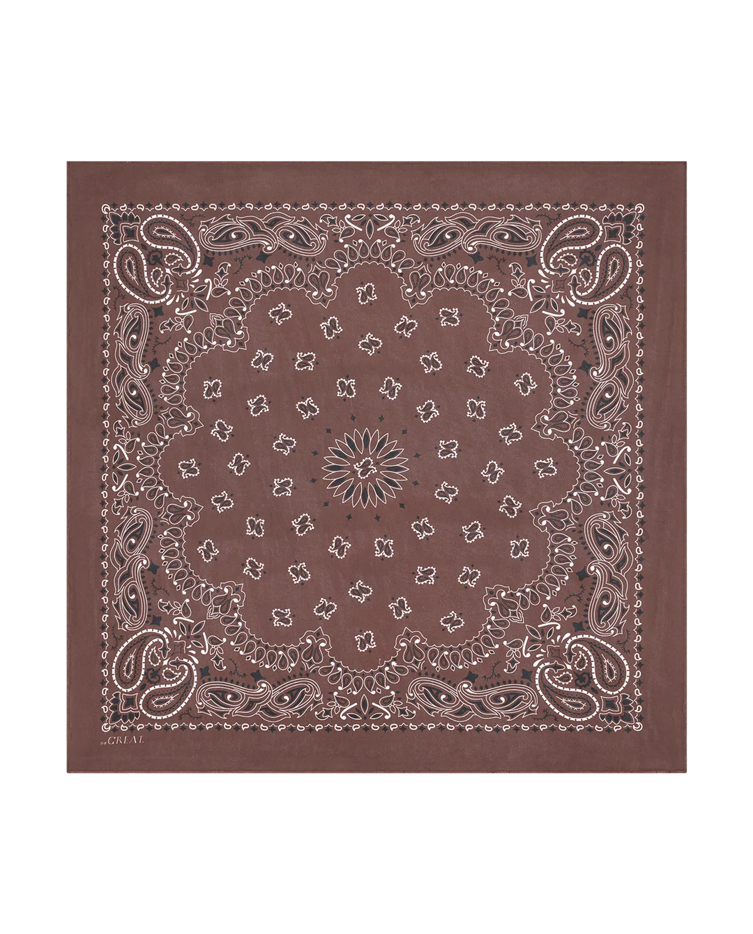 The Silk Bandana by The Great Inc. is a brown silk accessory with a classic paisley pattern and white decorative edges and center, offering an elegant vintage-inspired style.