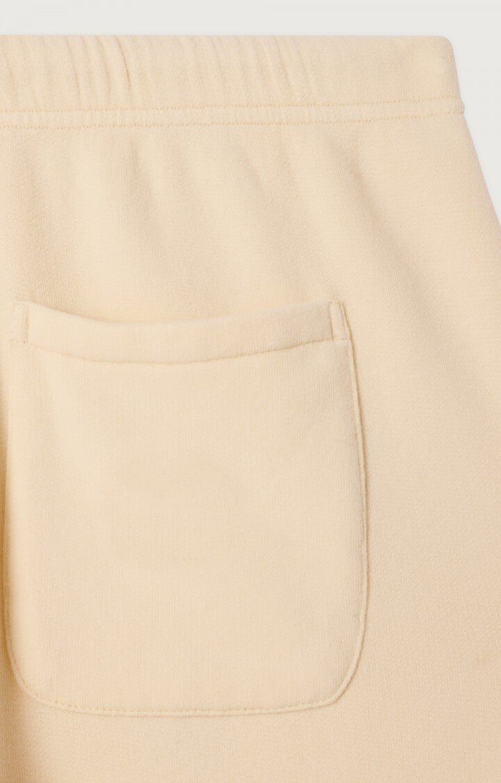 Close-up of the back pocket on Atubay Pants by American Vintage, showcasing the elastic waistband and soft cotton texture in beige.