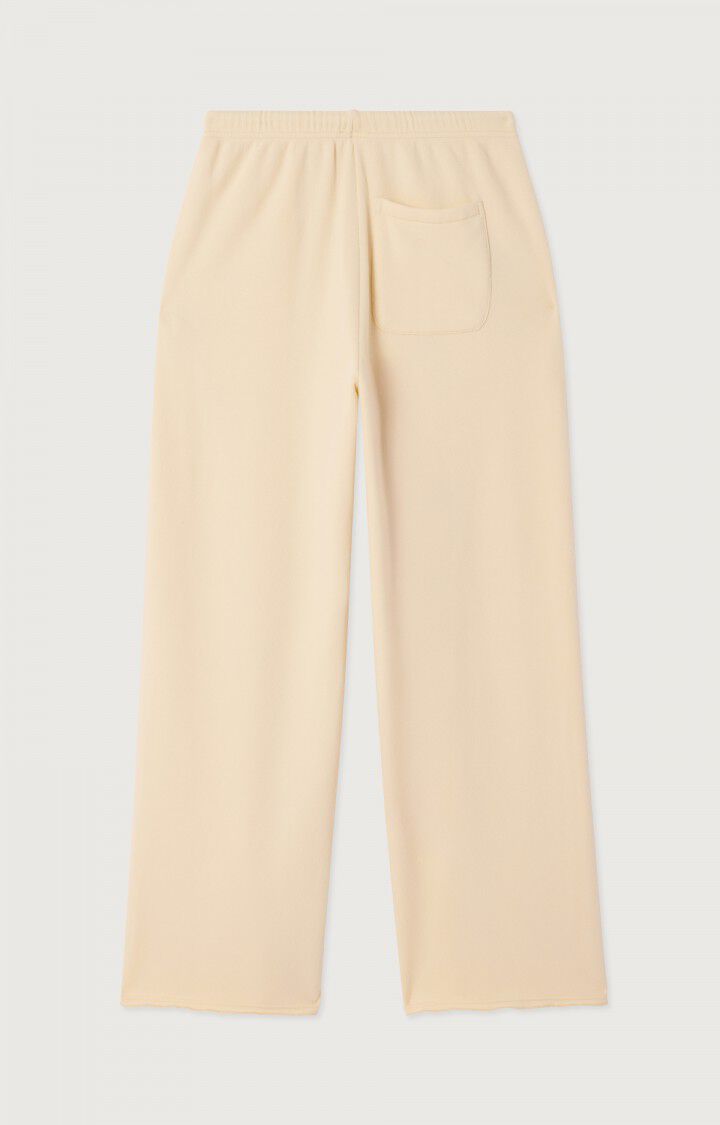 The Atubay Pants by American Vintage are beige, loose-fitting cotton pants with an elastic waistband and a single back pocket—ideal for pairing with your favorite sweatshirt. Laid flat on a plain light background.