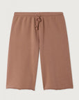 The Atubay Short by American Vintage is a pair of loose-fitting, knee-length brown cotton shorts with an elastic waistband and drawstring, made from soft fabric and shown against a plain light background.