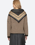 Declan S/Slv Polo Sweater by Sea New York in a soft knit, styled with a pleated skirt and scarf, back view.