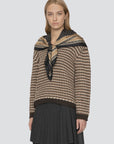 Short-sleeve polo sweater by Sea New York in light gray, featured against a minimalist background.