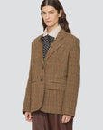Plaid wool blazer in modern tailoring by Sea New York, shown against a plain background.