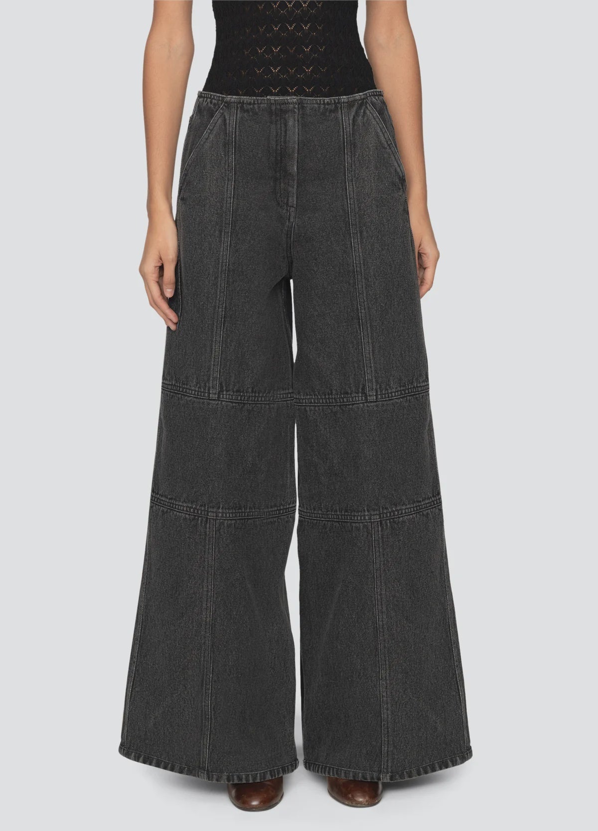Sea New York Zayna wide leg jeans with contrast stitching, modeled against a simple neutral backdrop.
