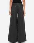 Sea New York Zayna black wide leg denim jeans, shown from the back with a matching black top.