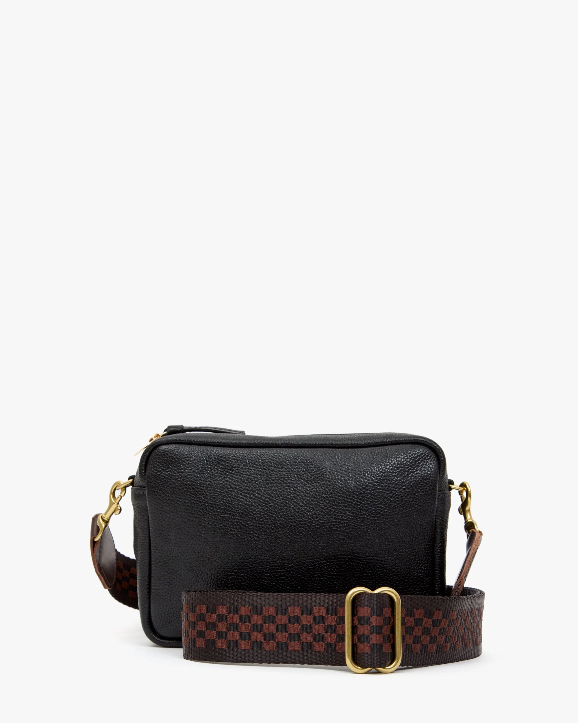 Clare Vivier's Crossbody Strap 26 is a small, black leather rectangular bag with gold zipper and hardware, featuring a wide brown checkered nylon strap with an adjustable gold buckle and brass snap hooks, shown on a plain white background.