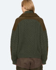Green Allen Cable Half Zip Sweater by Sea New York, shown from the back, paired with brown pants.