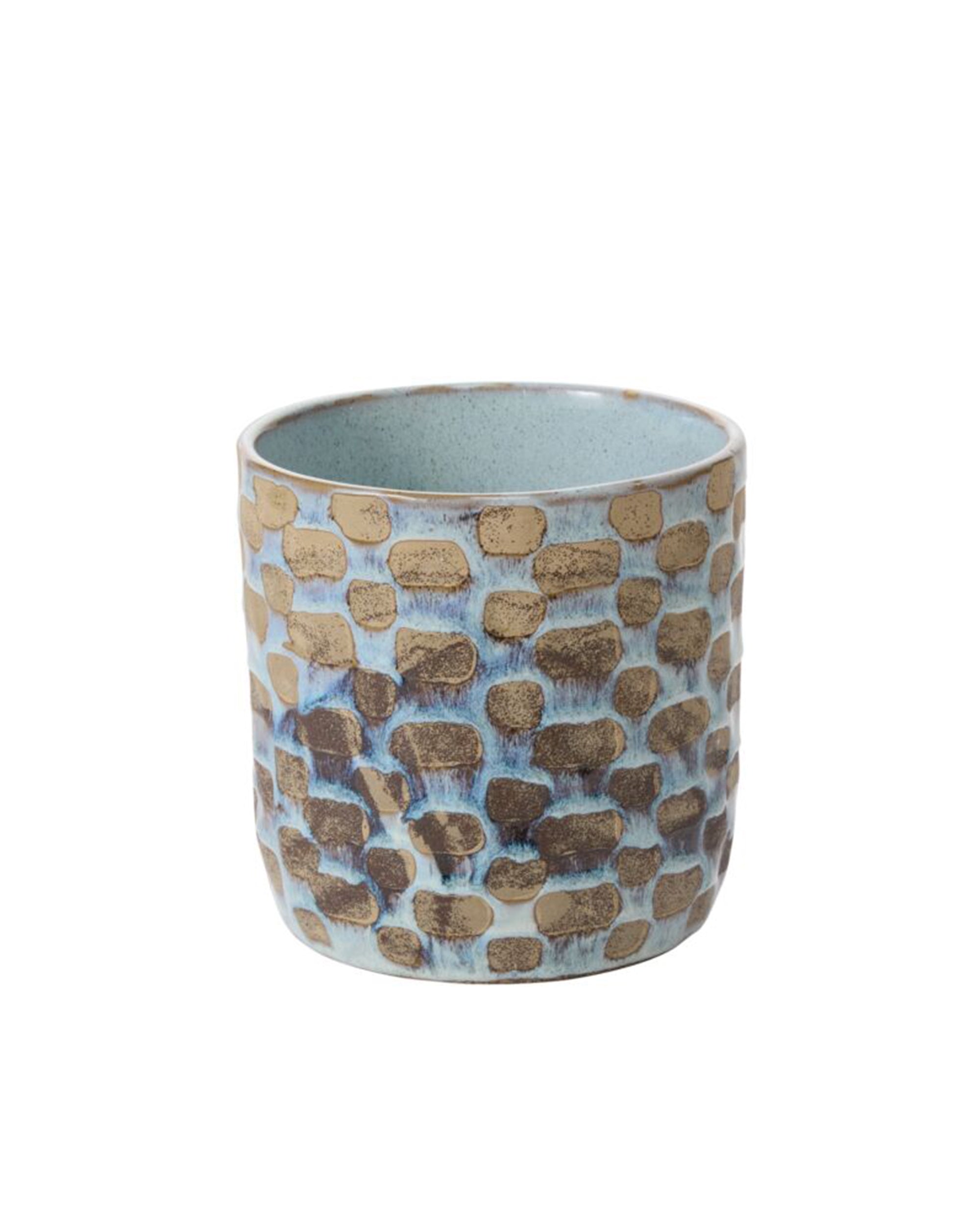 The Accent Decor 95927 Anselm Pot is a round artisanal ceramic planter with a textured tan and brown geometric pattern on a light blue background and a smooth, solid light blue interior.