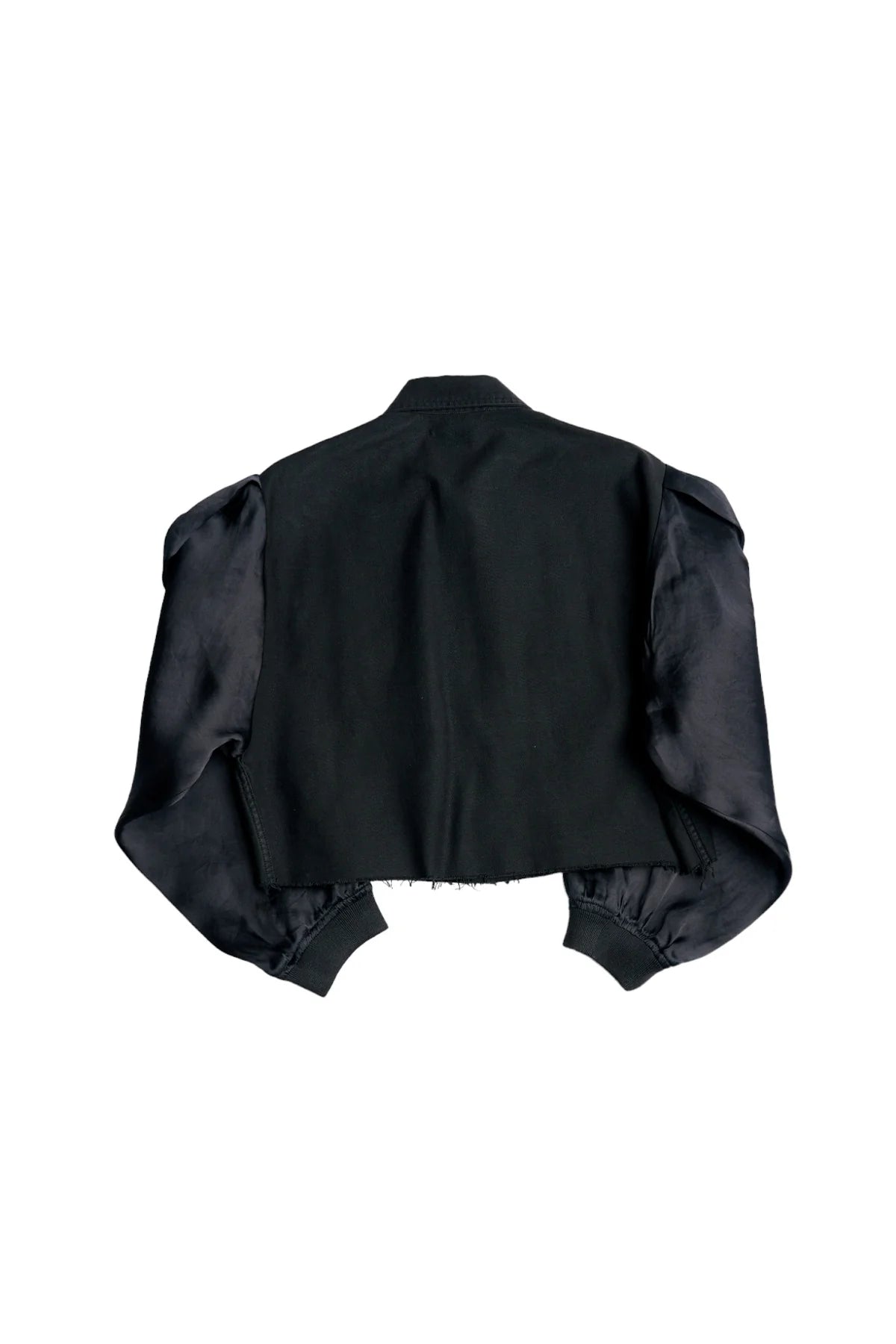The Ava Cropped Jacket Organza Sleeve by Aquarius Cocktail features shiny black silk organza sleeves and a matte garment dyed cotton body, shown flat from the back against a white background.