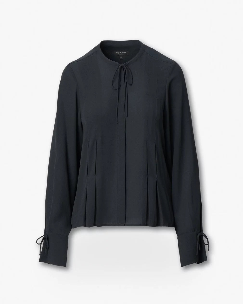 The Rag & Bone arden pleated blouse features long sleeves, a round neckline, feminine ties at the collar and cuffs, and front pleats, shown in black on a plain white background.