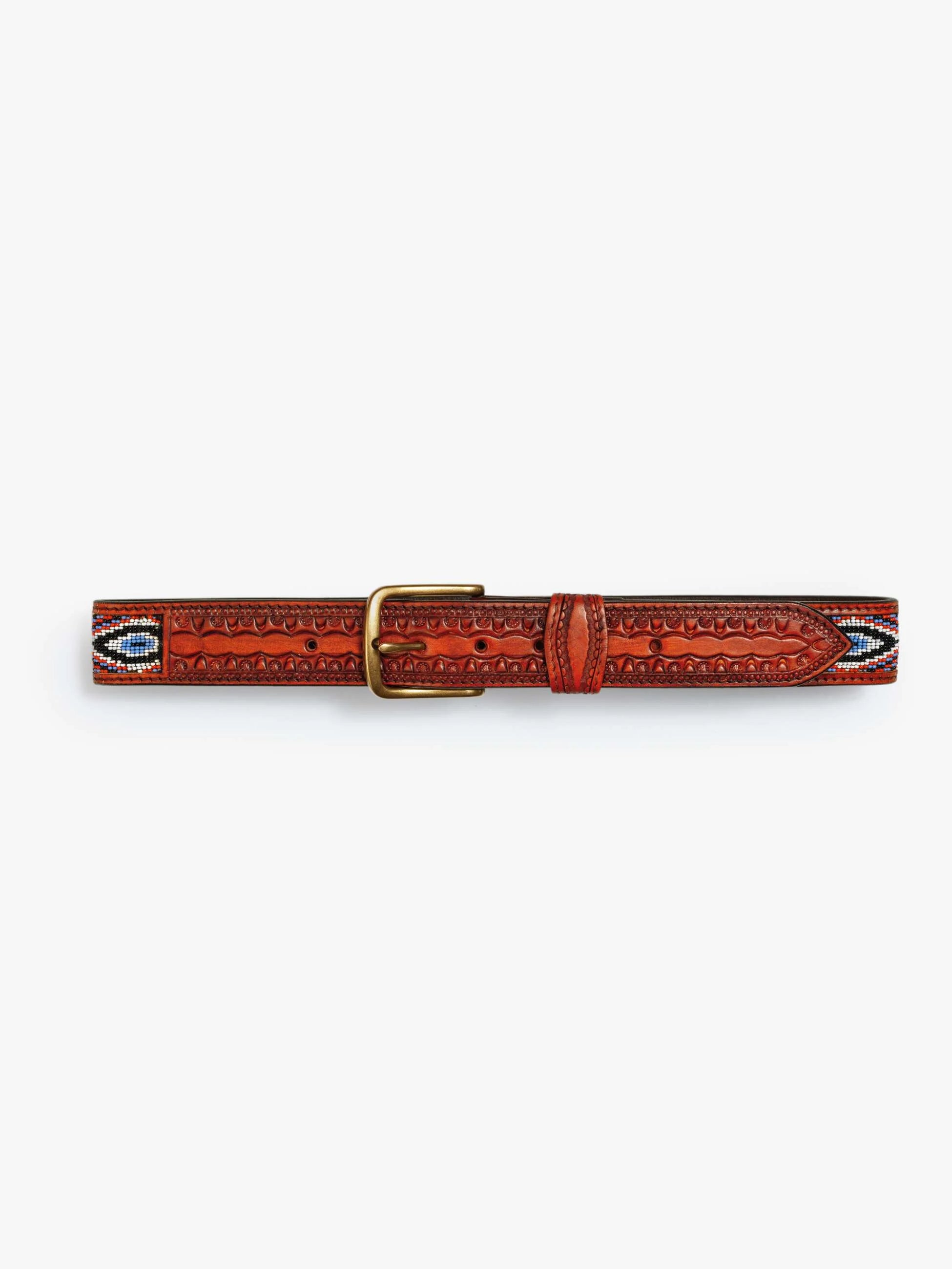 The Eye Opener by Mother is a vintage brown cow leather belt featuring an ornate brass buckle, tooled patterns, and colorful beaded designs at both ends, displayed on a white background.