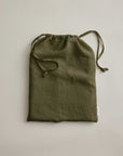 Olive green linen duvet cover by Cultiver Goods, European flax, displayed on a neutral background.