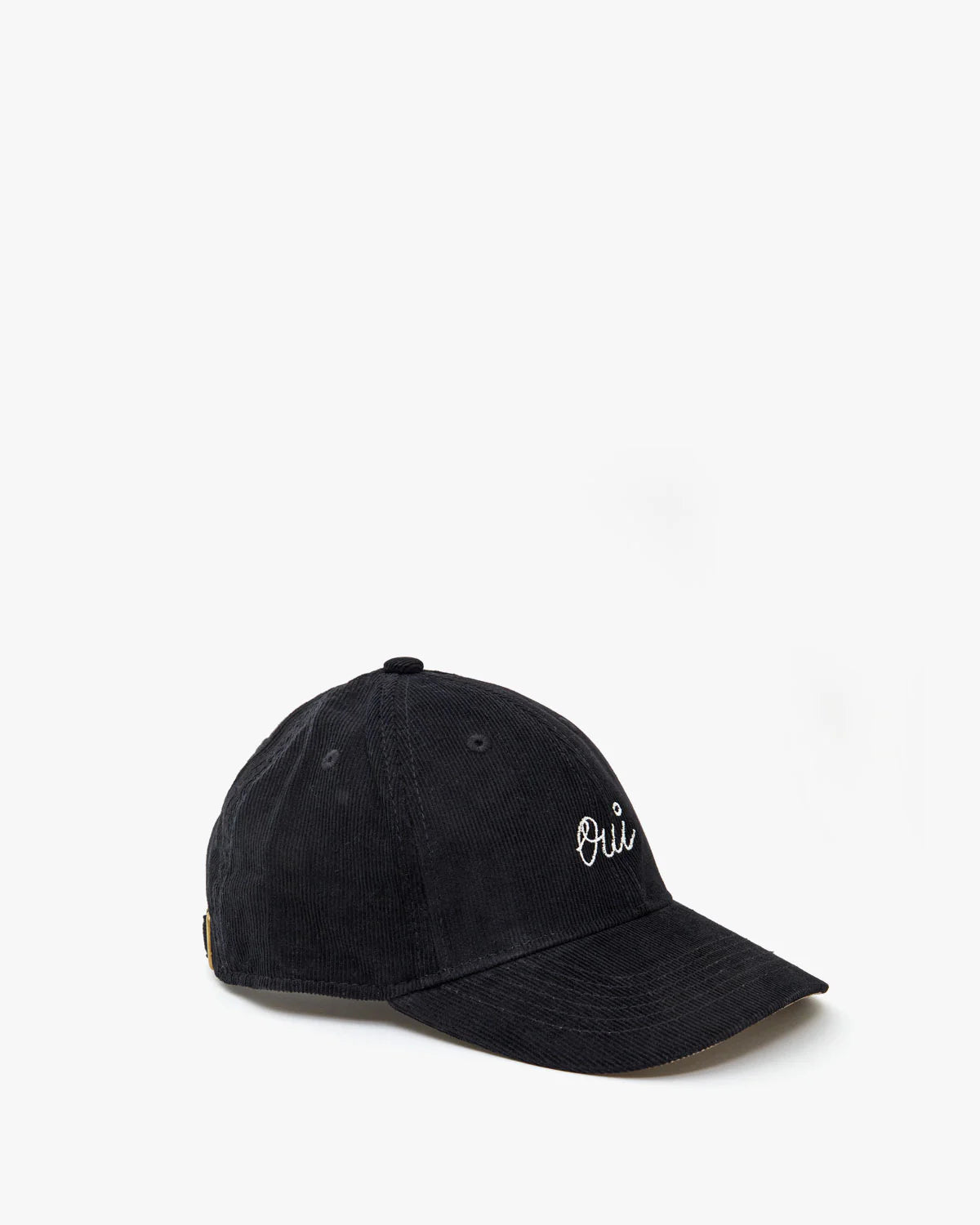 Clare Vivier's black corduroy baseball hat features "Oui" embroidered in white on the front. Perfect for a celebrity in disguise, it has a curved brim and an adjustable back strap.