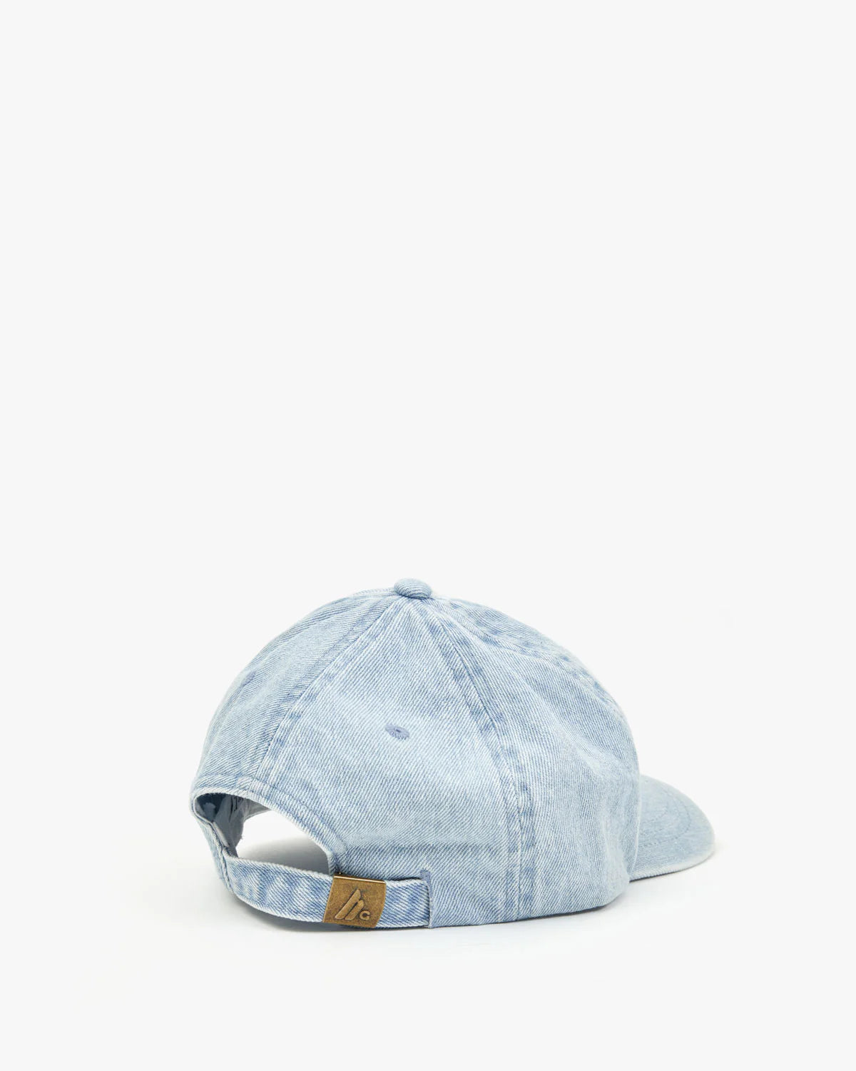 On a white background, the Clare Vivier light denim embroidered Baseball Hat is shown from the back, featuring an adjustable strap with a brown leather tag. This cap showcases its casual and versatile style—ideal for any celebrity seeking effortless cool in disguise.