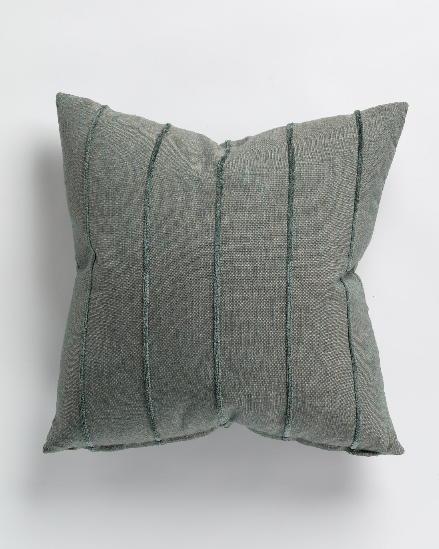 A Hilo Stripe Blue Spruce Pillow 26x26 with a muted green fabric, featuring three vertical stitched stripes, displayed against a light grey background in Gabby style.