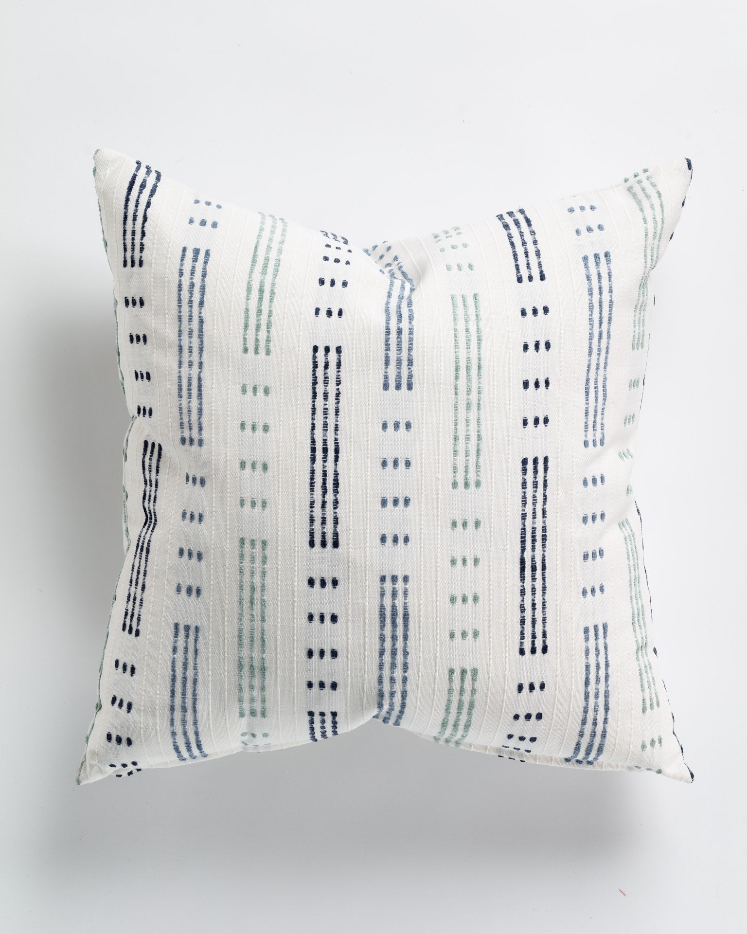 Decorative Lucky Stripe Rain Pillow 26x26 by Gabby with a geometric pattern in shades of blue and black on a white background, ideal for a Scottsdale, Arizona bungalow. The design features vertical stripes with dots and dashes.