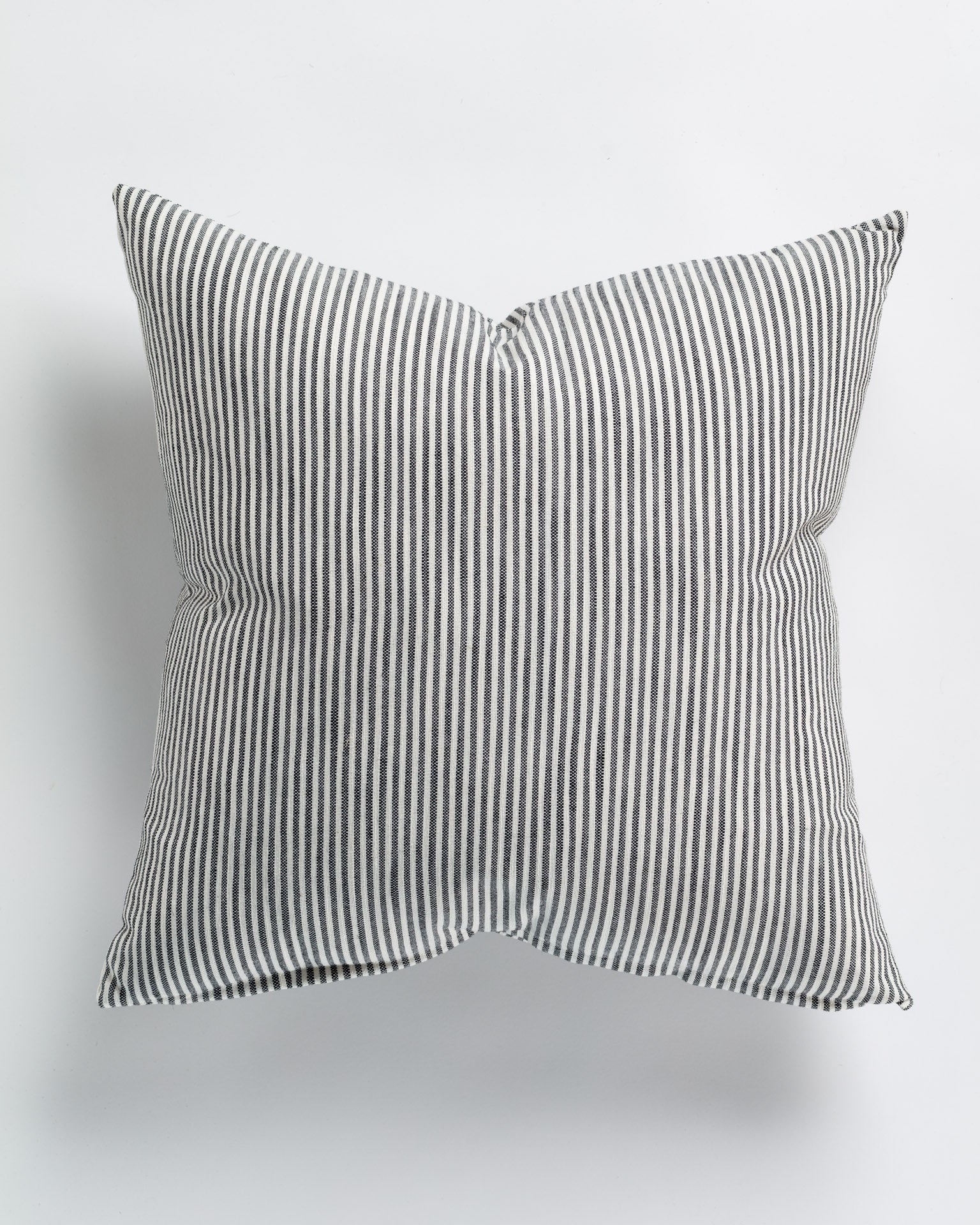 A square Skinny Stripe Classic Pillow 26x26 from Gabby with a black and white striped pattern, displayed against a plain white background in a Scottsdale Arizona bungalow.