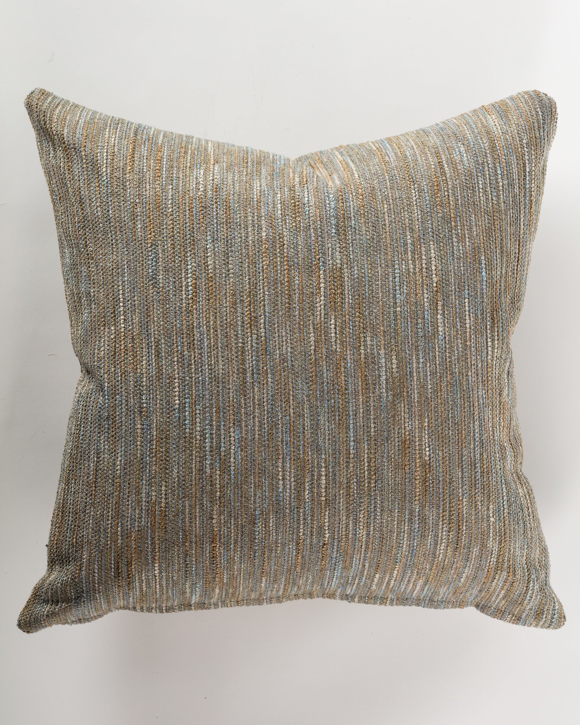 Indulge in extraordinary comfort with the Entangled Pastel Pillow 26x26 from Gabby, showcasing a square, textured design with striped patterns in shades of brown, gray, and blue on a crisp white background. This Euro pillow includes the insert for enhanced convenience and style in your living space.