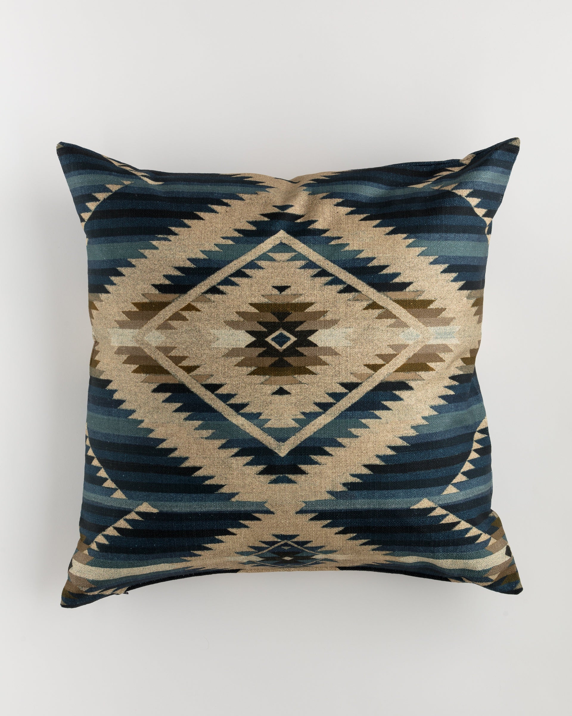 The Pindler Custom 2 Pillow 28x28 is a square pillow featuring a southwestern-style pattern in shades of blue, beige, and brown. The design incorporates geometric shapes such as diamonds and zigzags, creating a symmetrical and visually appealing look. This luxurious pillow includes an insert for added convenience.