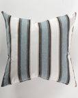 Introducing the Custom 2 Pillow 28x28 from Pindler—a luxurious square pillow featuring vertical stripes in blue, white, and brown set against a plain background. It's perfect for enhancing your decor and fits seamlessly with euro pillows or any soft pillow insert of your choice.