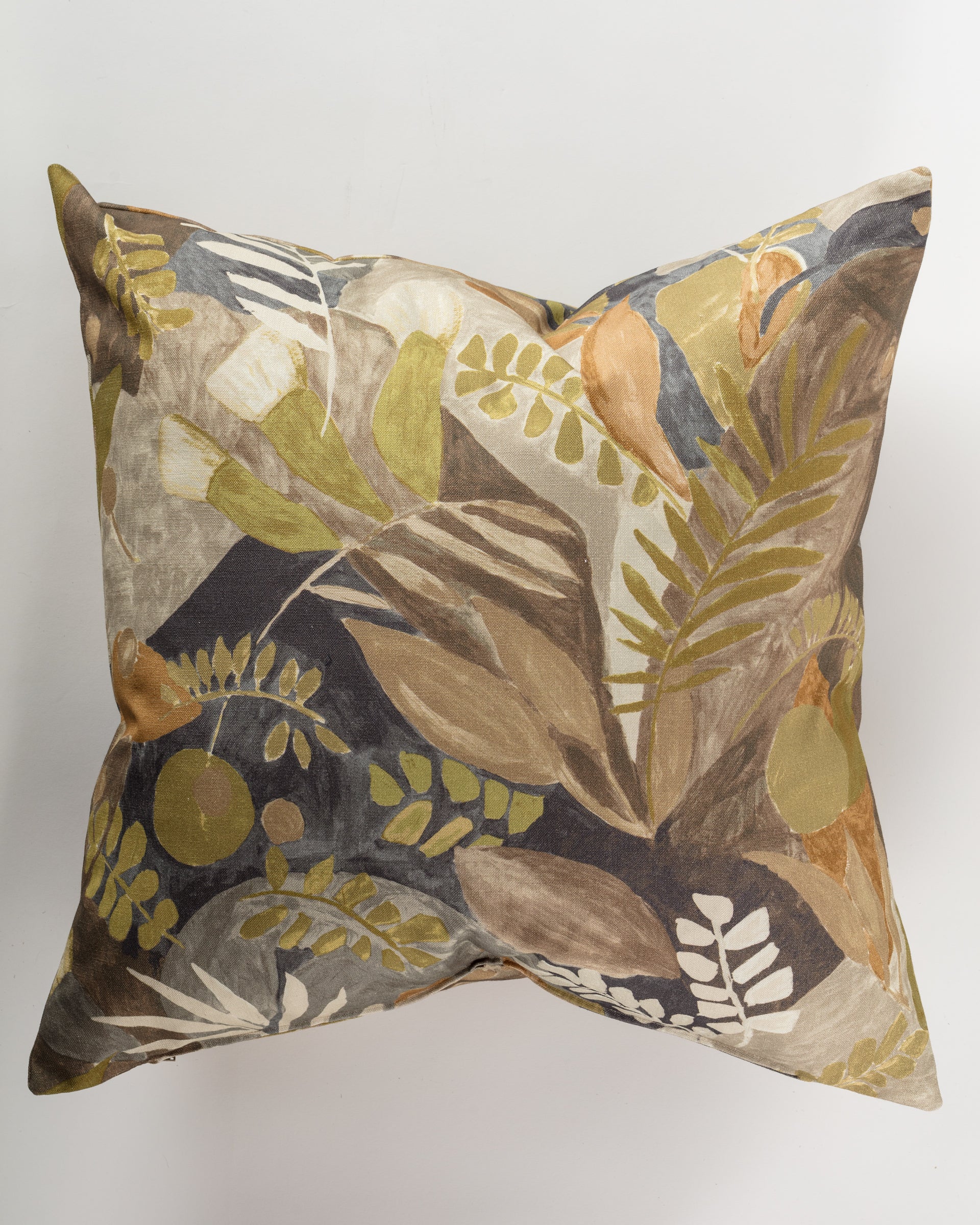 Introducing the Pindler Custom 2 Pillow 28x28, a square cushion showcasing a nature-inspired design adorned with leaves and abstract shapes in soothing shades of green, brown, and beige on a light background. This ultra-luxurious pillow comes complete with an insert to ensure maximum comfort.