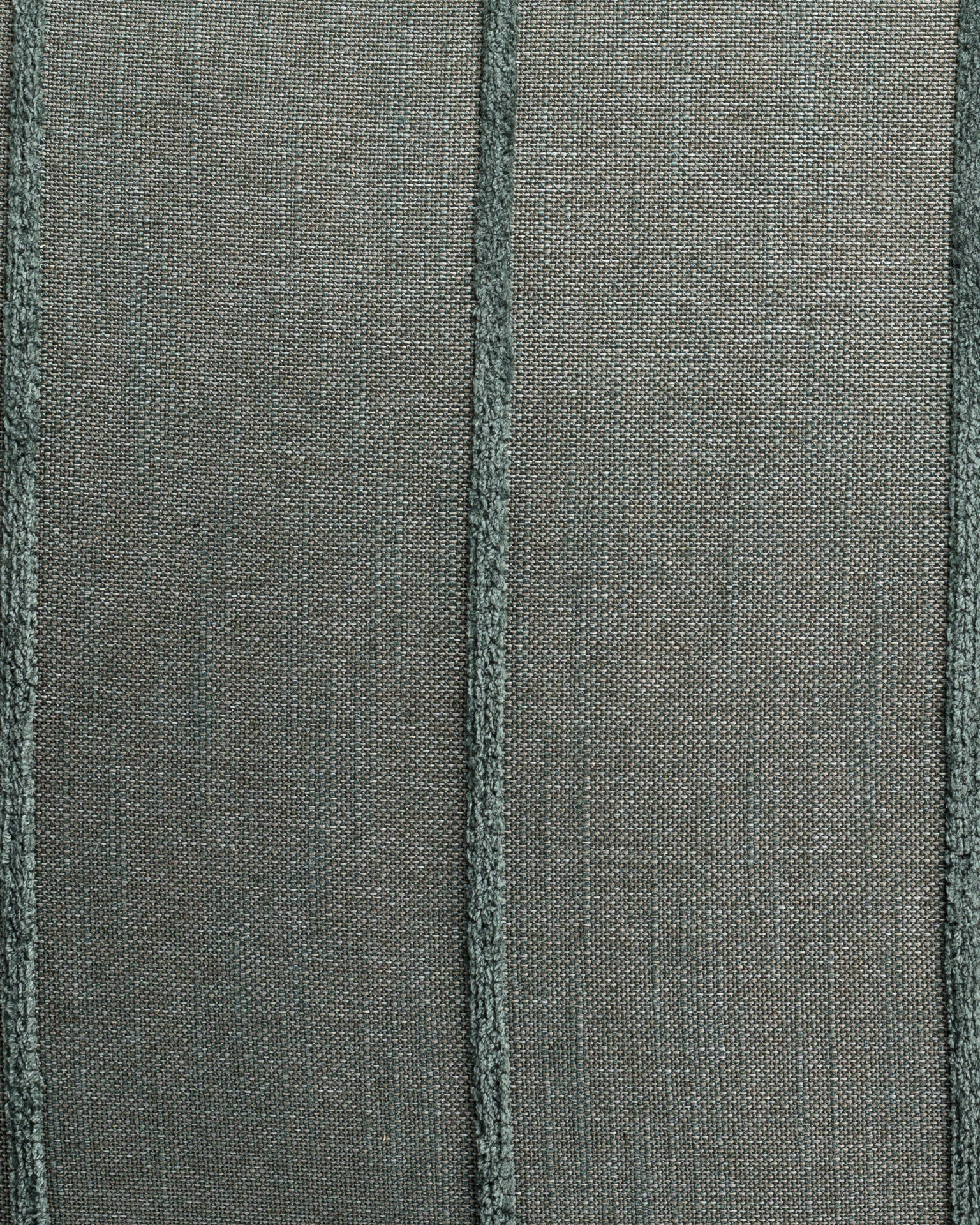 Close-up of a Gabby Hilo Stripe Blue Spruce Pillow 26x26 with visible seam lines and fine stitching detail, highlighting the weave and threads in a bungalow style.