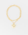 A Lucky Star Bubble Heart Necklace with a medium heart-shaped pendant is displayed against a white background. The 33" chain consists of interlocking links with the gold heart pendant hanging at the center. The design is simple and elegant.