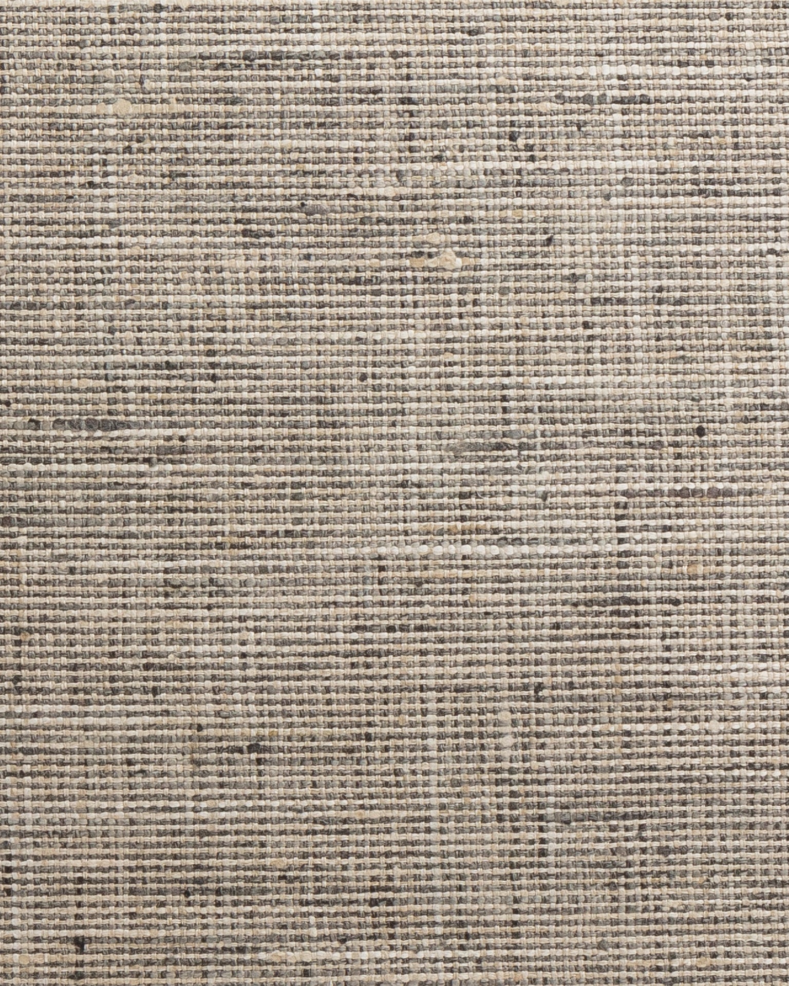 Close-up texture of a Grasscloth Steel 24x24&quot; fabric in a bungalow, with a woven, slightly rough texture showing horizontal and vertical thread patterns. (Brand: Gabby)