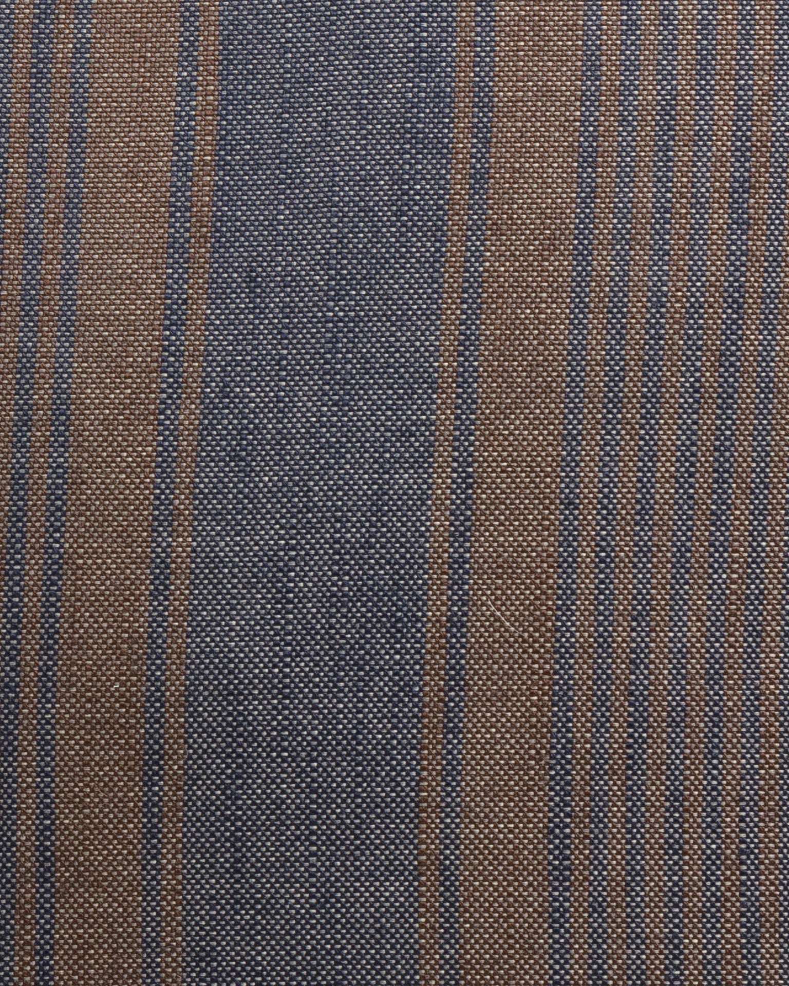 Close-up of a Casual Stripe Bark 24x24&quot; fabric with alternating brown and navy blue stripes, detailed with fine white dots on the navy sections in a Scottsdale bungalow by Gabby.