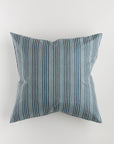 Introducing the Pindler Custom 1 Pillow 28x28—a luxurious euro cushion adorned with a cover that features vertical blue and white stripes. The alternating pattern of thicker and thinner lines creates a sophisticated textured appearance, all set against a pristine white background. Complete with an included pillow insert, this elegant piece is sure to elevate any space.