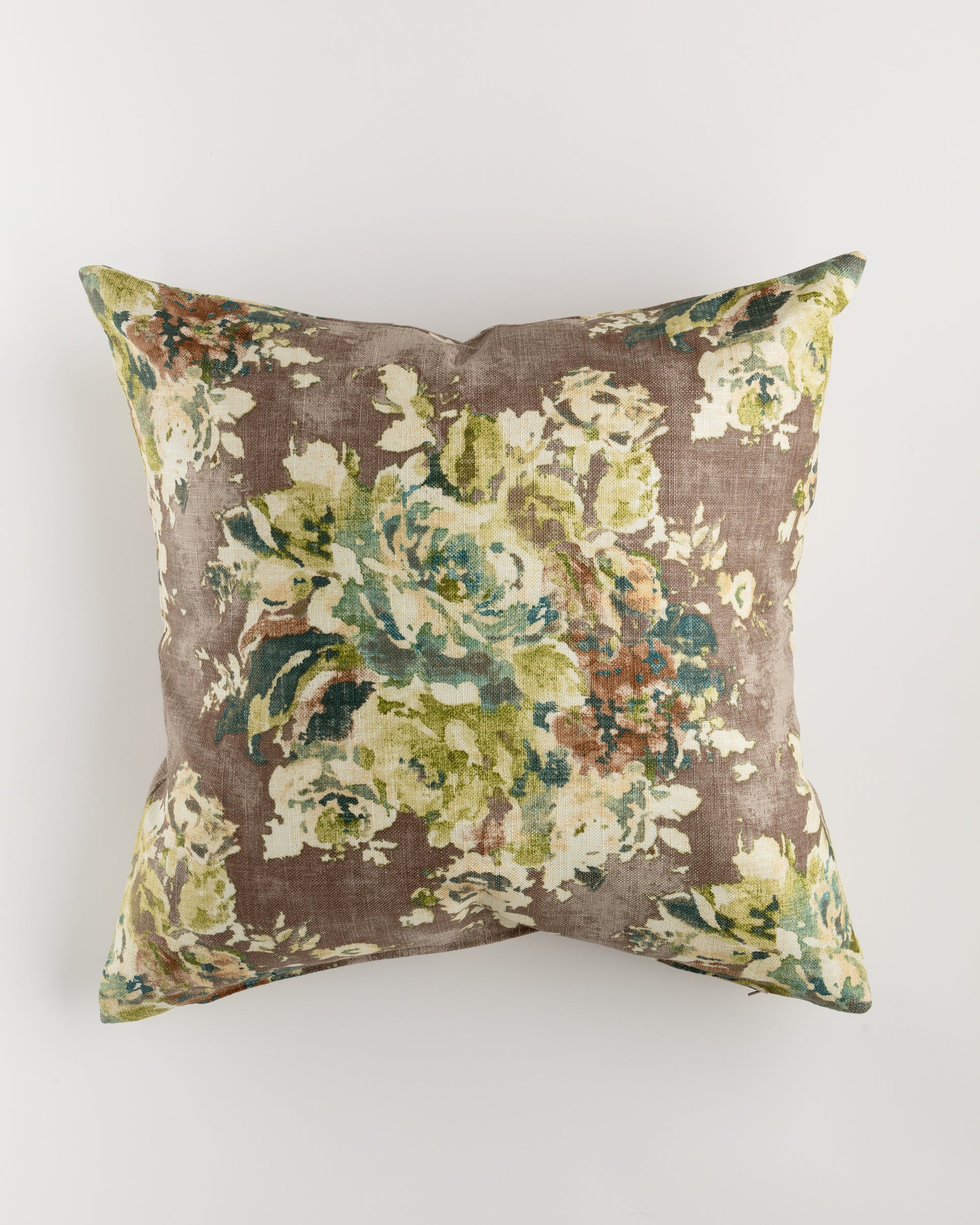 The Custom 1 Pillow 28x28 by Pindler is a square throw pillow showcasing a vintage floral pattern in shades of green, blue, and brown against a muted taupe background. This pillow provides extra comfort and features a slightly worn, rustic look that enhances its luxurious vintage charm.