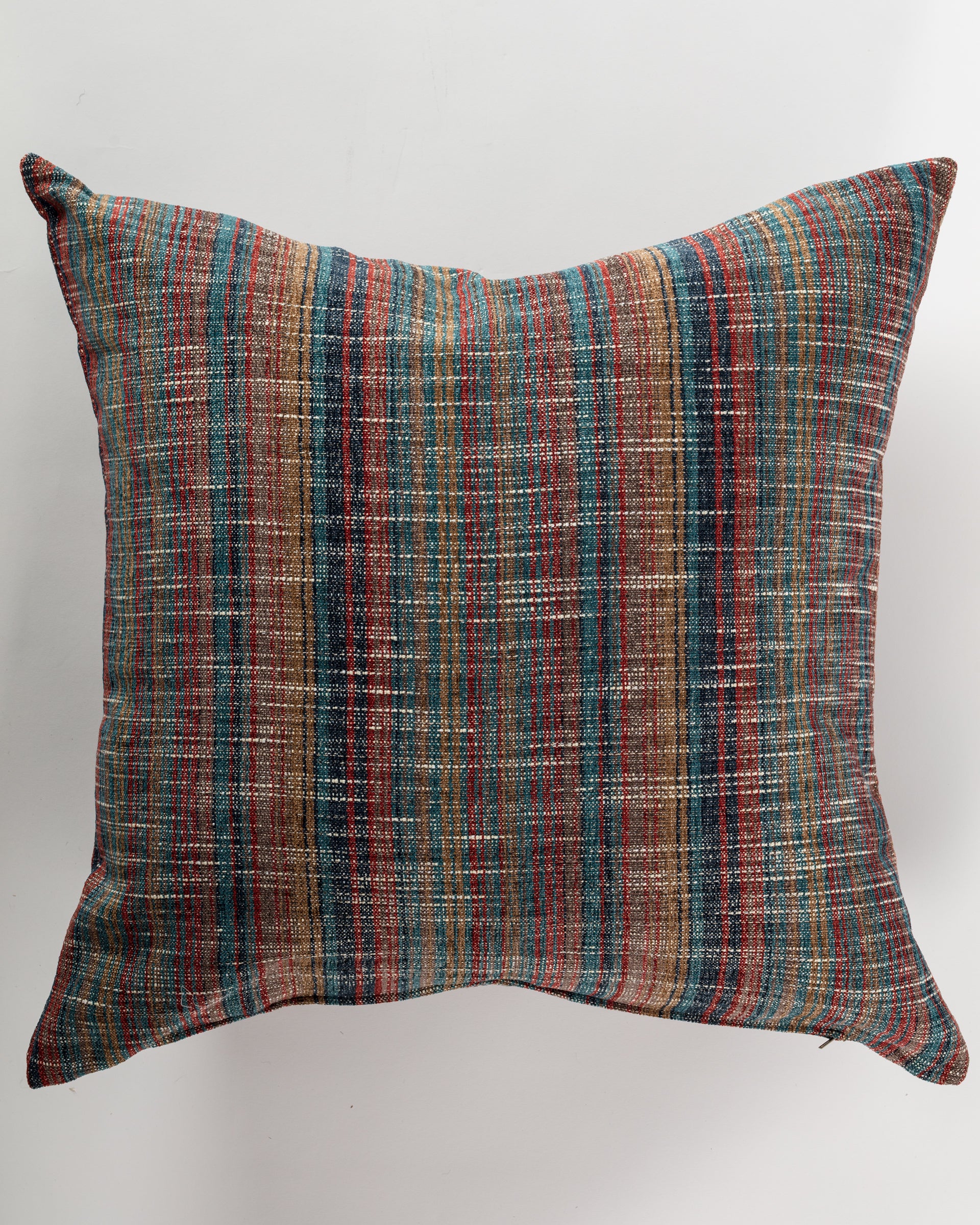 The Custom 3 Pillow 28x28 by Pindler is a square pillow designed with a woven, multicolored striped pattern incorporating shades of blue, red, and tan on a light background. It provides both comfort and support while adding an elegant touch to any decor.