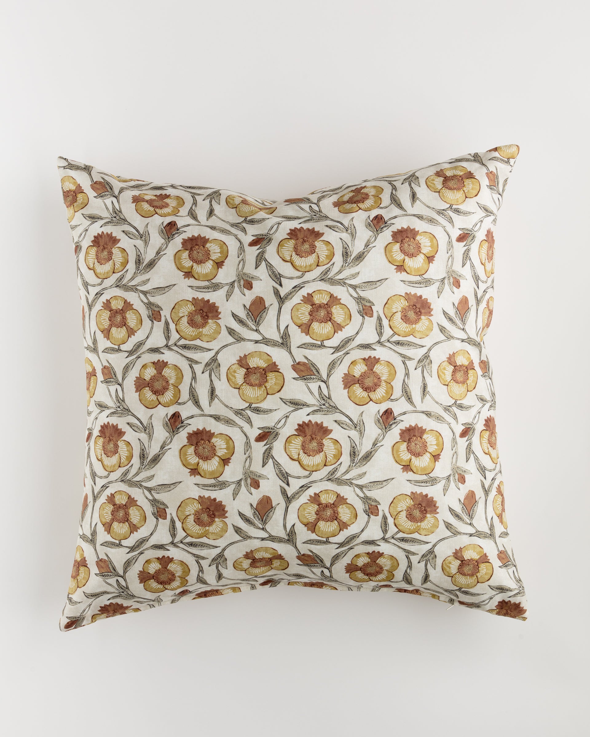 The Custom 2 Pillow 28x28 by Pindler is a square cushion with a white background and a floral pattern. The design showcases yellow and orange flowers with green leaves and stems, creating a natural, vintage look. This ultra-luxurious Euro pillow measures 28x28 inches and includes the pillow insert.