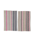 Creative Co-op's Woven Cotton Tea Towel features a pair of rectangular towels with varying vertical stripes in blue, pink, and beige. Each towel presents a unique mix of bold and thin patterns, highlighting exquisite kitchen textiles.