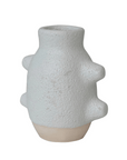 The Ceramic Caterpillar Vase by Creative Co-op is a textured white stoneware piece with a bulbous shape, featuring four rounded nubs. It has an abstract silhouette, narrow neck, matte finish, and sits on a lighter base. This design merges minimalism with modern aesthetics.