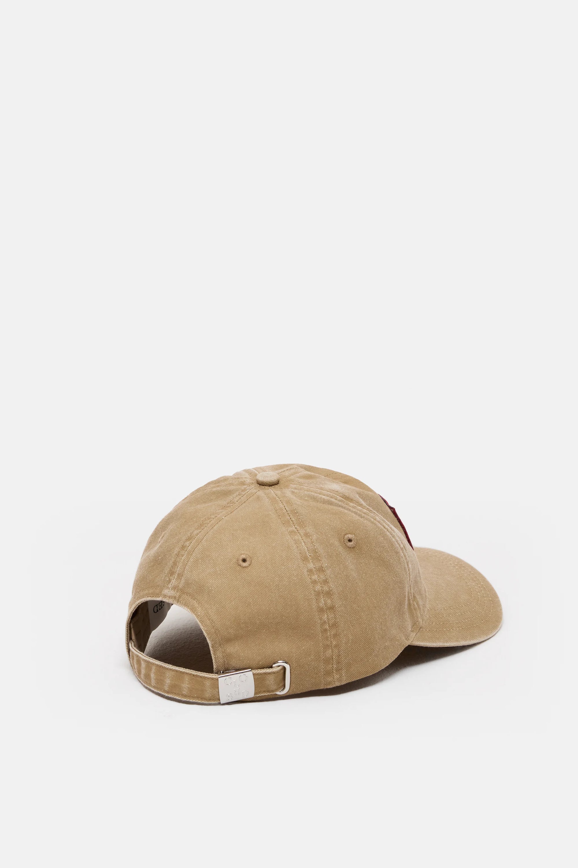 The CLOSED Cap in tan cotton is shown from the back, highlighting a metal buckle on the adjustable strap and visible stitching on the crown and brim for a classic washed finish.