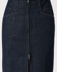 The CLOSED Zip Skirt is crafted from dark blue Italian denim and features an X-pocket design, a bold front zipper running from waistband to hem, and detailed visible stitching.
