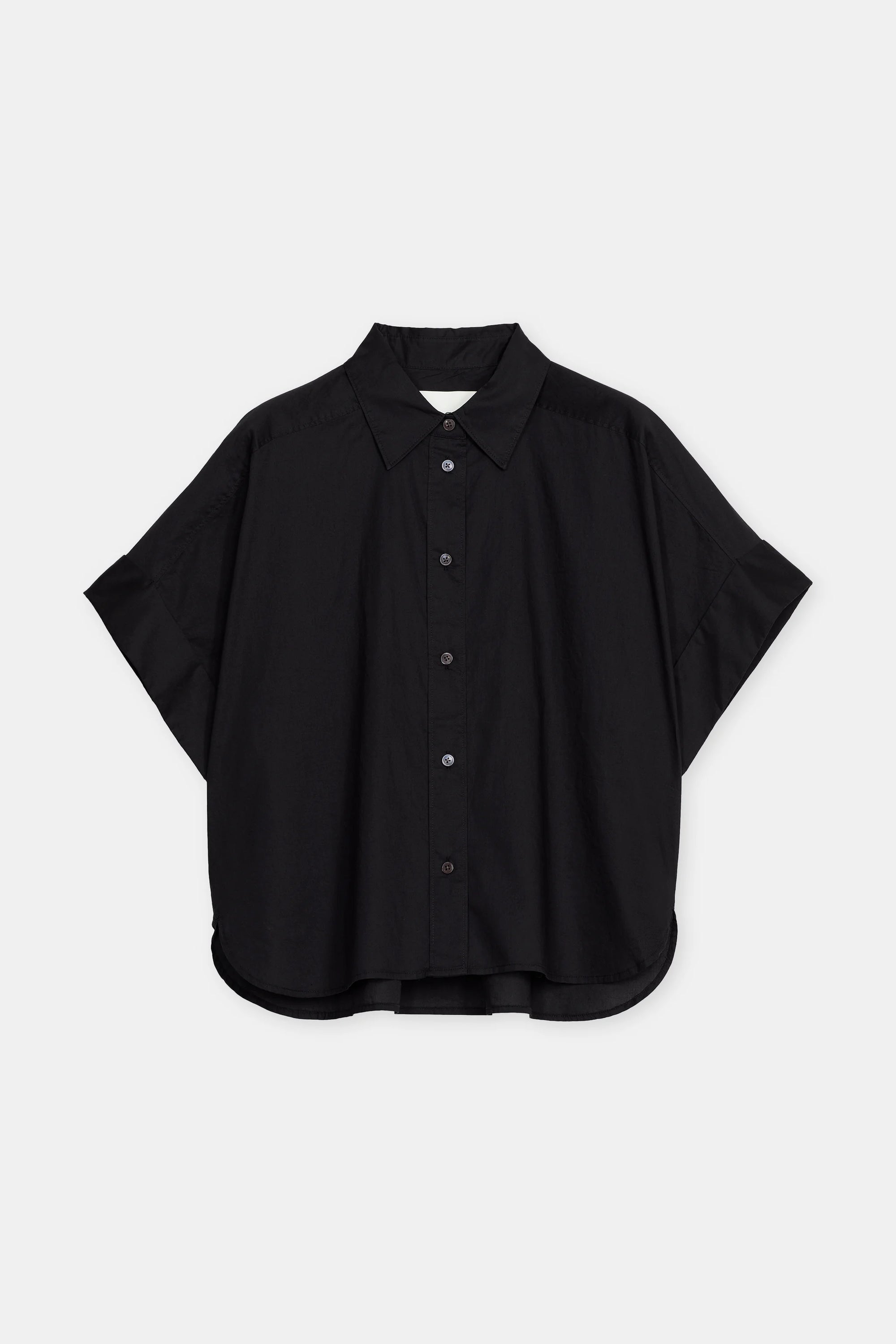 The CLOSED Turn-Up Shirt is a relaxed fit black cotton shirt with short sleeves, a pointed collar, and mother-of-pearl buttons, shown on a plain white background.
