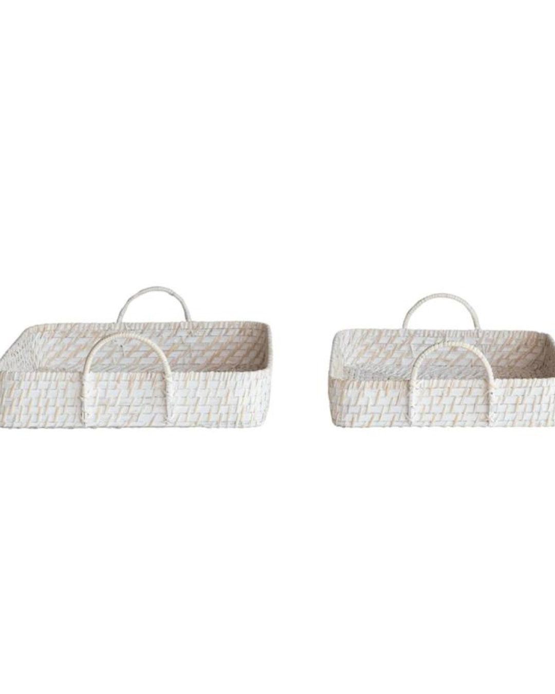 Two "Bamboo Tray White" hand-woven rectangular trays from Creative Co-op, placed side by side. The trays are light-colored and feature a simple, open weave design. The sturdy handles are attached to the shorter sides, making them practical for carrying.